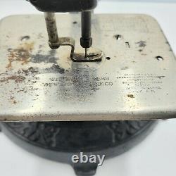 Antique WILCOX & GIBBS Tabletop Sewing Machine with Heavy Base. Turns Freely