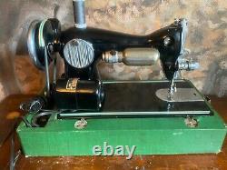 Heavy duty sewing machine. Sews leather, similar to Singer 15-91. Fully restored