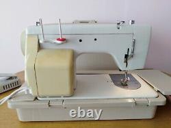New Home 632 heavy duty electric sewing machine working case, book + accessories