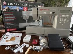 SINGER Heavy Duty 6700C Electronic Sewing Machine 411 Stitch Applications LCD