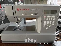 SINGER Heavy Duty 6700C Electronic Sewing Machine 411 Stitch Applications LCD