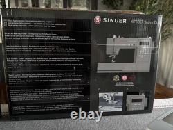 SINGER Heavy Duty 6700C Electronic Sewing Machine 411 Stitch Applications LCD