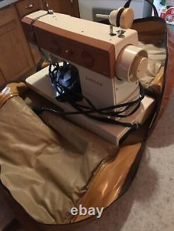 Singer 5522 Heavy Duty Sewing Machine with Foot Pedal Vintage And Leather Case