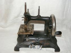 Vintage Child's Toy Sewing Machine Heavy Cast Iron Gold Scrolling Hand Crank