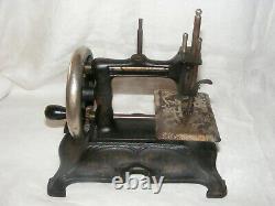 Vintage Child's Toy Sewing Machine Heavy Cast Iron Gold Scrolling Hand Crank