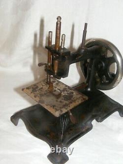 Vintage Child's Toy Sewing Machine Heavy Cast Iron Gold Scrolling Hand Crank